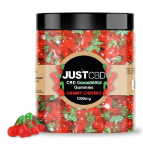 A tub of red and green cherry flavoured CBD gummies with a black lid